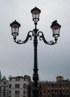a lamp post and pigeon at Venice Train Station